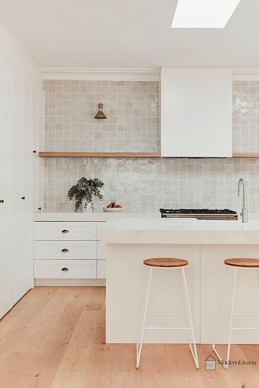 10 Modern White Kitchen Ideas You'll Want to Save Right Now 3 Textured Zellige Tile Backsplash