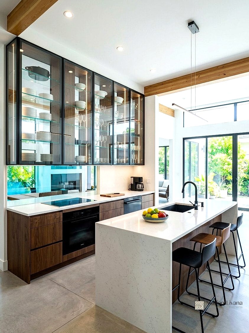 Use Glass-Front Cabinets for a Few Doors
