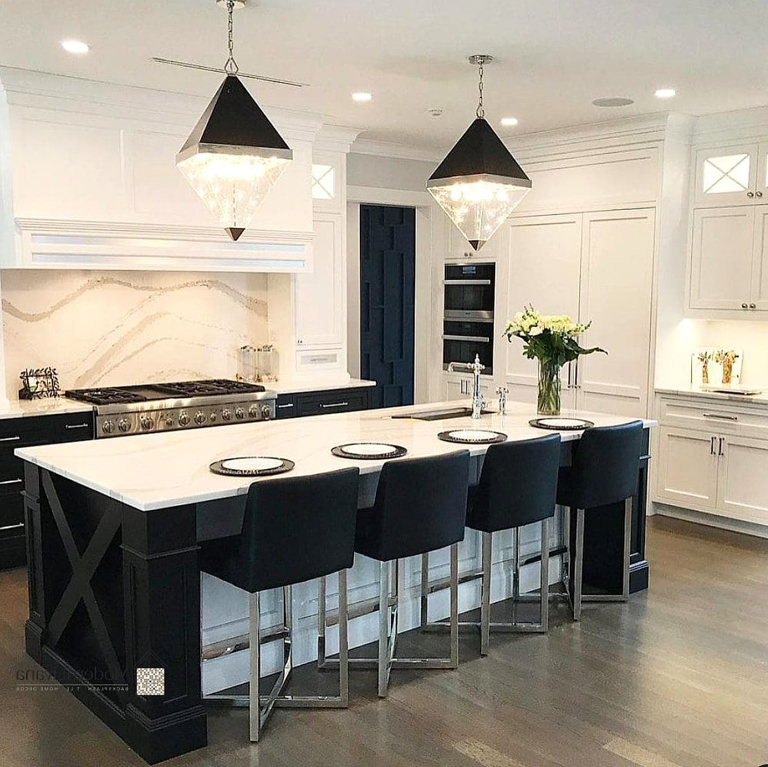 White Cabinets with a Black Island