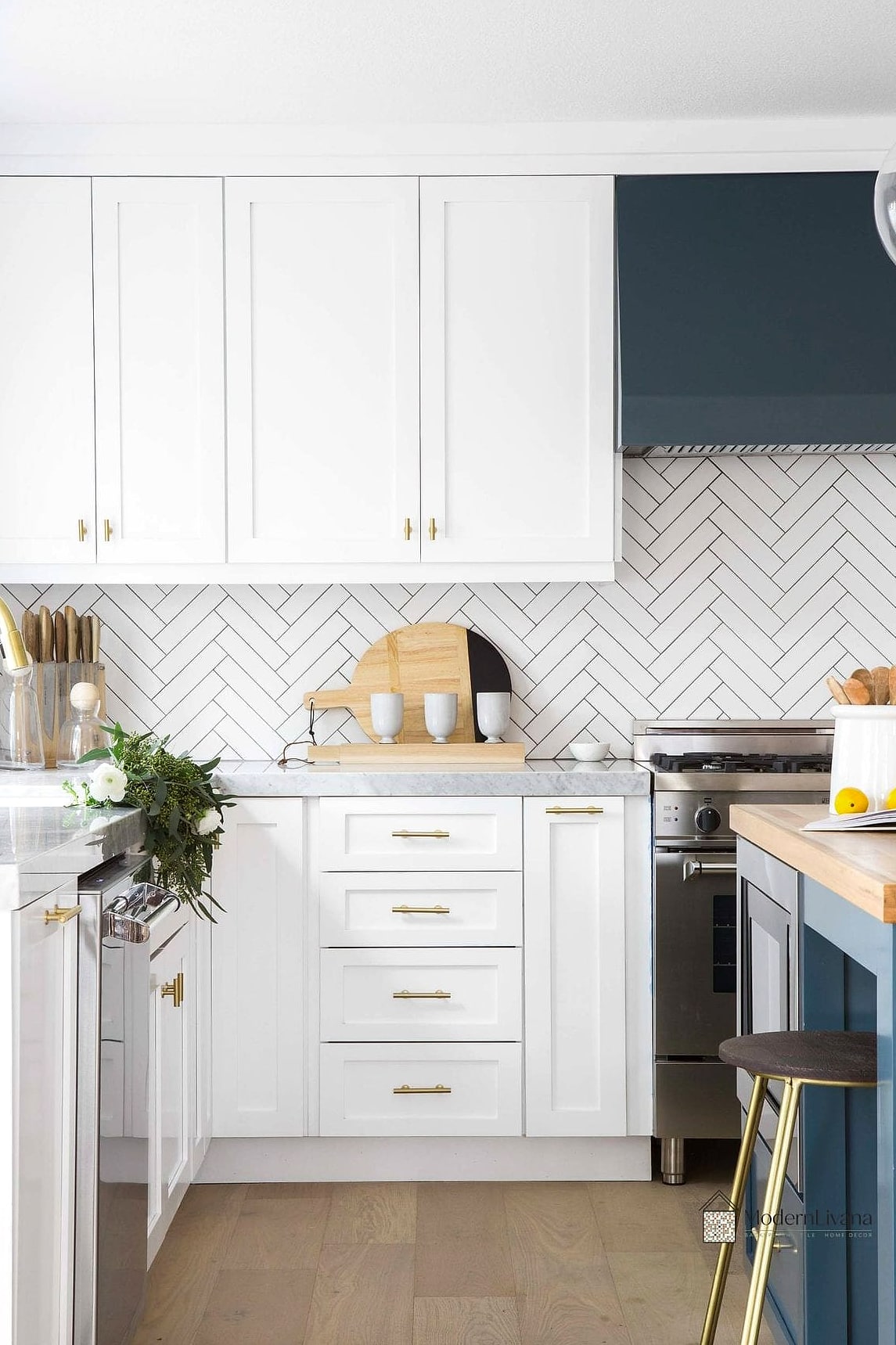 26 White Cabinets Ideas for Every Home Style and Budget 14 White Cabinets with Herringbone Backsplash