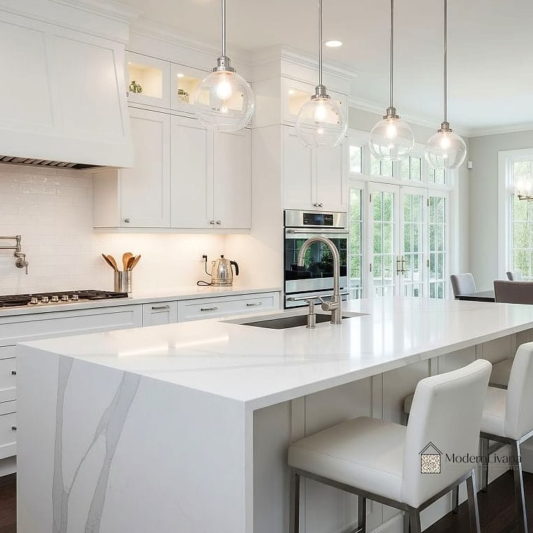 26 White Cabinets Ideas That Look Expensive But Aren't 14 White Cabinets with a Waterfall Countertop