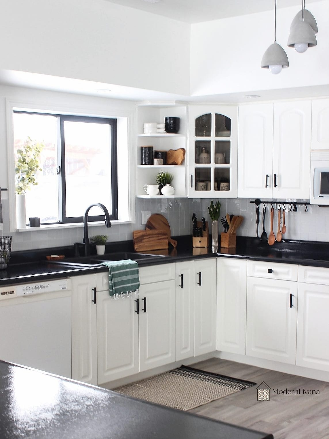 30 White Cabinets Ideas Perfect for Any Budget 29 White Cabinets with Black Countertops