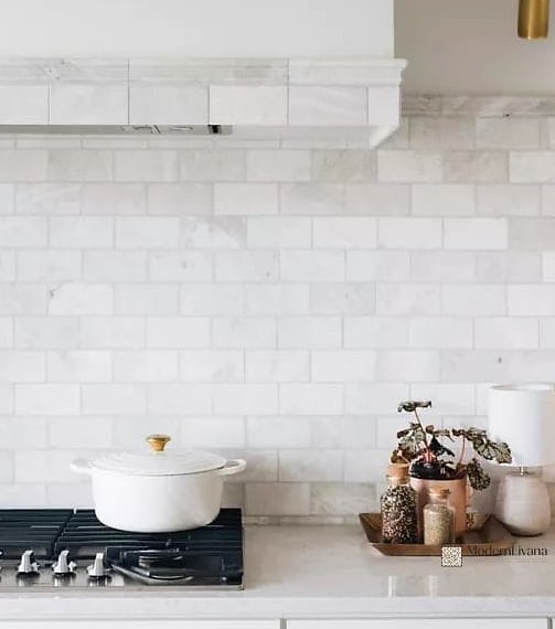 24 White Backsplash Ideas That Work in Any Size Home 8 White Marble Subway Tile