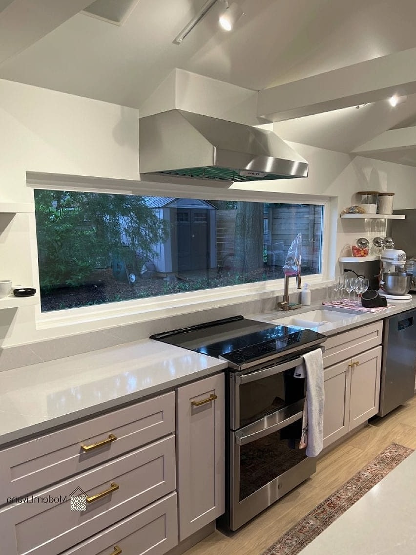 21 Kitchen Window Ideas Worth Stealing From Interior Designers 8 A Window Above the Stove for Ventilation