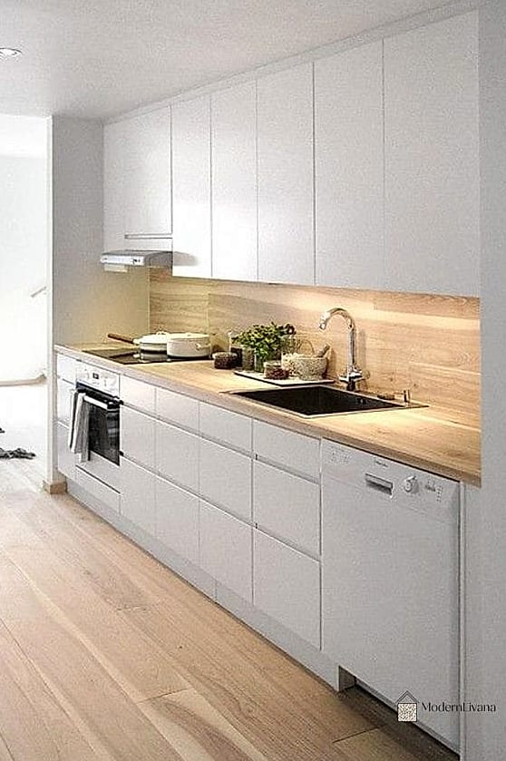 23 White Modern Kitchen Ideas Worth Bookmarking Before You Renovate 14 Wood Countertops on a White Island